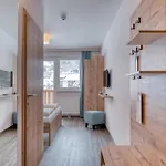 Отель Cooee Alpin 4*